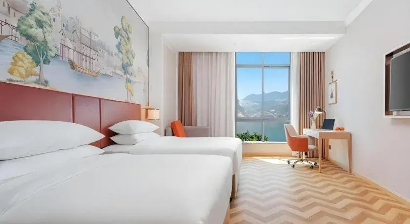 Bed in Vienna Hotel Chongqing Wushan Municipal Government Bed in Vienna Hotel Chongqing Wushan Municipal Government