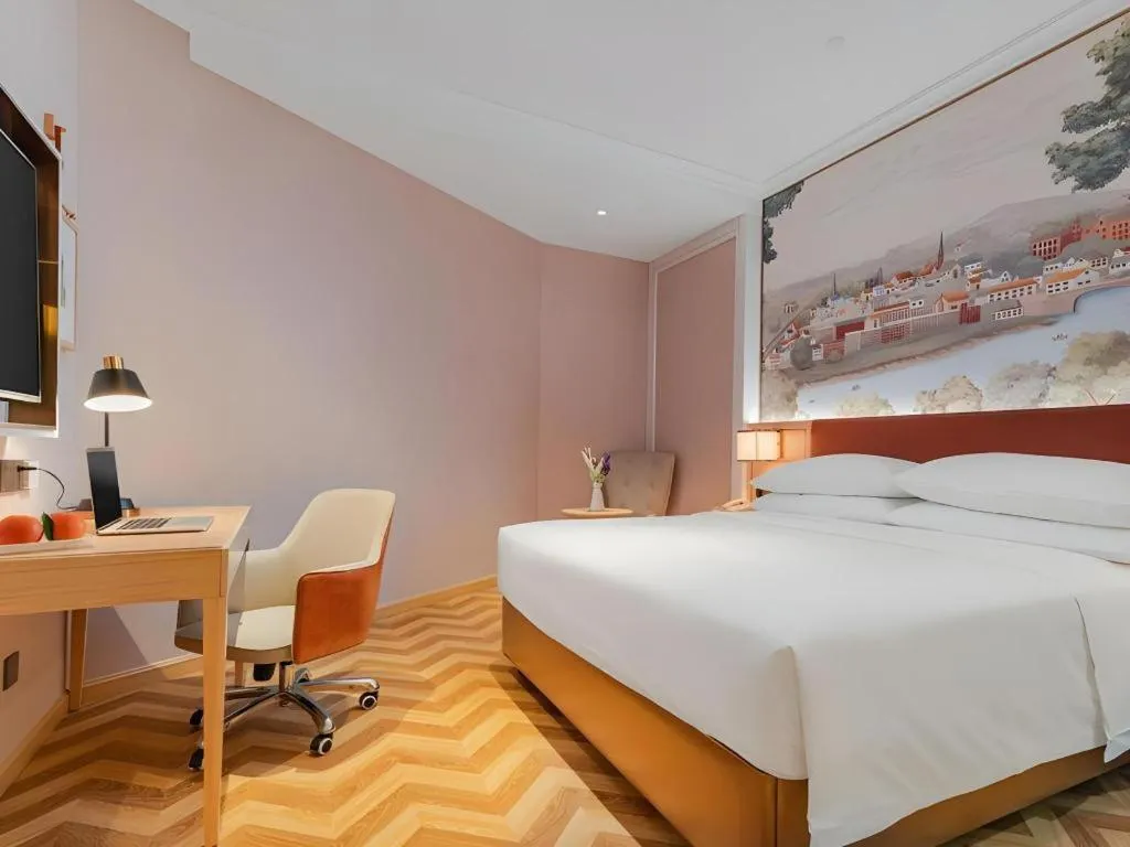 Bed in Vienna Hotel Chongqing Wushan Municipal Government