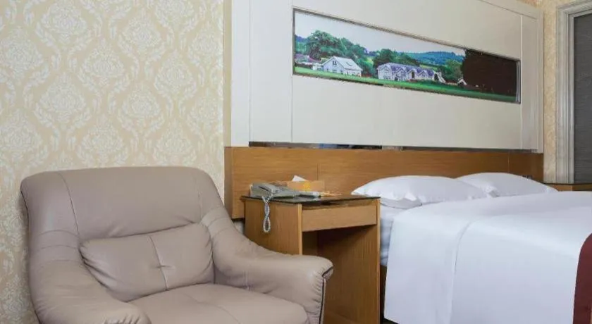 Bed in Vienna Hotel Guangdong Zhuhai Mingzhu Station Guozheng