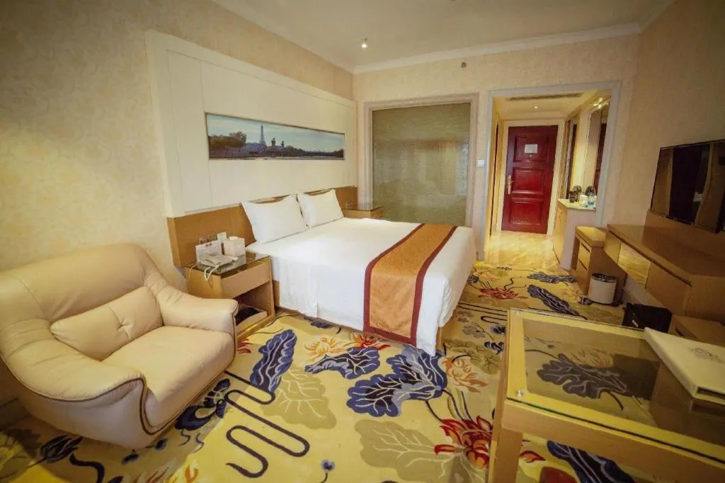 Bed in Vienna Hotel Guangdong Zhuhai Mingzhu Station Guozheng