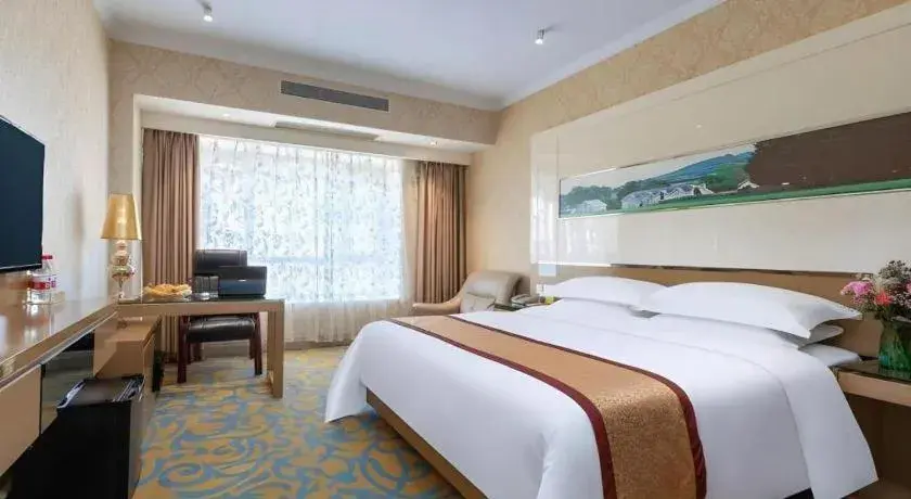 Bed in Vienna Hotel Guangdong Zhuhai Mingzhu Station Guozheng Bed in Vienna Hotel Guangdong Zhuhai Mingzhu Station Guozheng