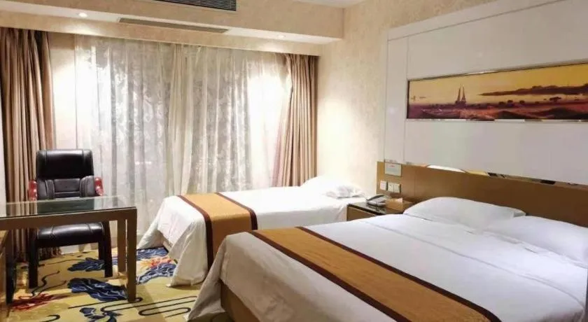 Bed in Vienna Hotel Guangdong Zhuhai Mingzhu Station Guozheng