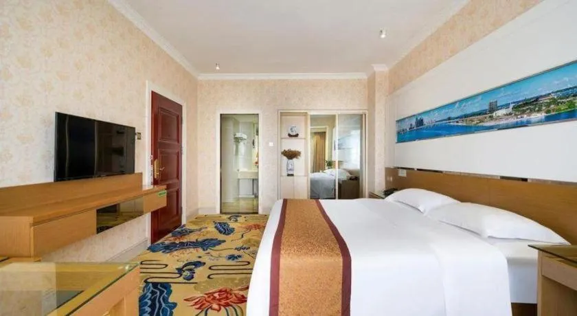 Bed in Vienna Hotel Guangdong Zhuhai Mingzhu Station Guozheng