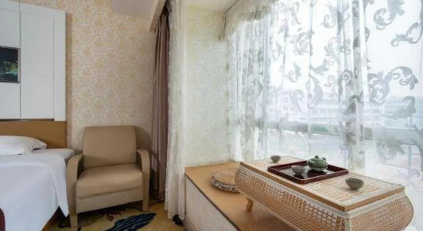 Bed in Vienna Hotel Guangdong Zhuhai Mingzhu Station Guozheng