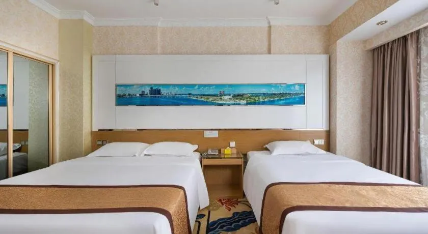 Bed in Vienna Hotel Guangdong Zhuhai Mingzhu Station Guozheng