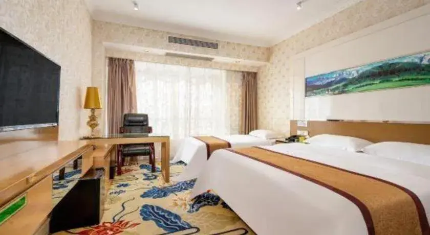 Bed in Vienna Hotel Guangdong Zhuhai Mingzhu Station Guozheng Bed in Vienna Hotel Guangdong Zhuhai Mingzhu Station Guozheng