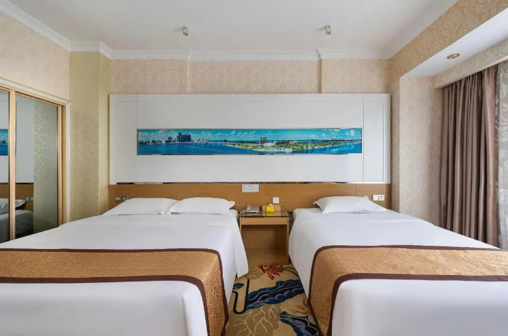 Bed in Vienna Hotel Guangdong Zhuhai Mingzhu Station Guozheng
