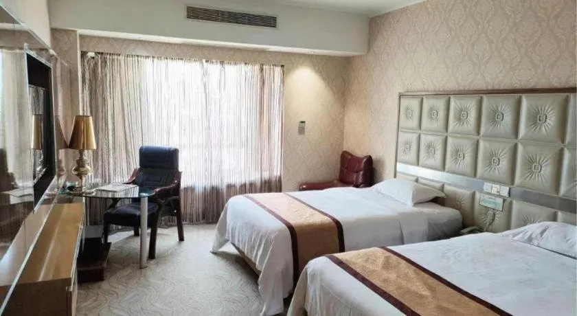 Bed in Vienna Hotel Guangdong Zhuhai Mingzhu Station Guozheng