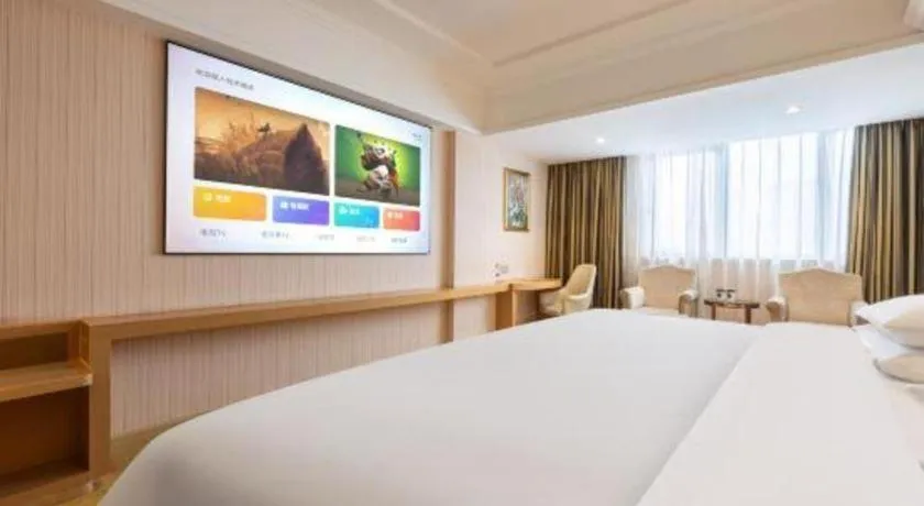 Bed in Vienna Hotel Guangzhou Baiyun Airport Huadu Avenue