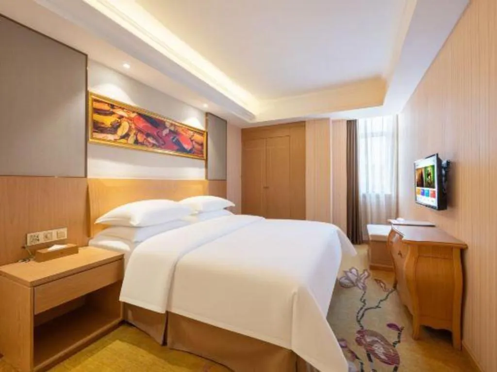 Bed in Vienna Hotel Guangzhou Baiyun Airport Huadu Avenue