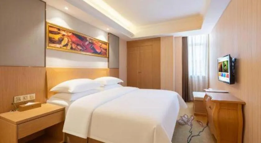 Bed in Vienna Hotel Guangzhou Baiyun Airport Huadu Avenue