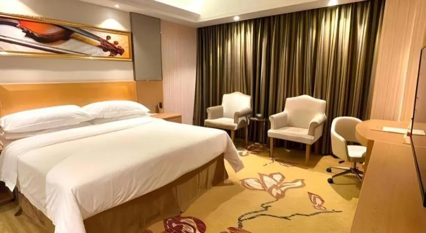 Bed in Vienna Hotel Guangzhou Baiyun Airport Huadu Avenue