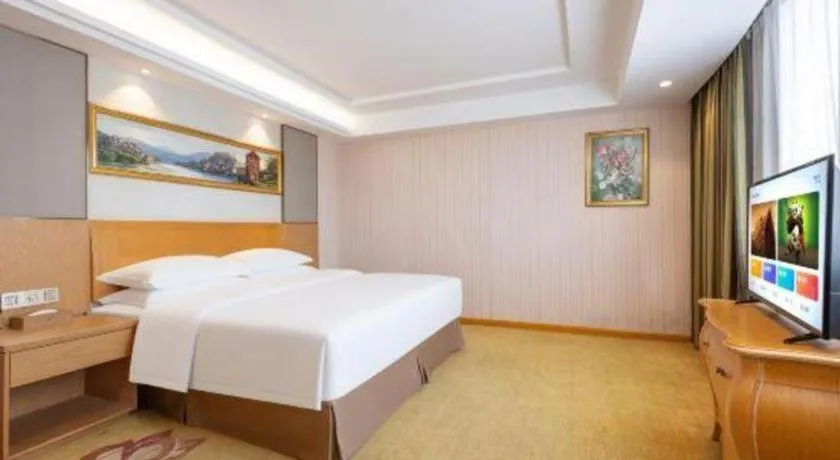 Bed in Vienna Hotel Guangzhou Baiyun Airport Huadu Avenue