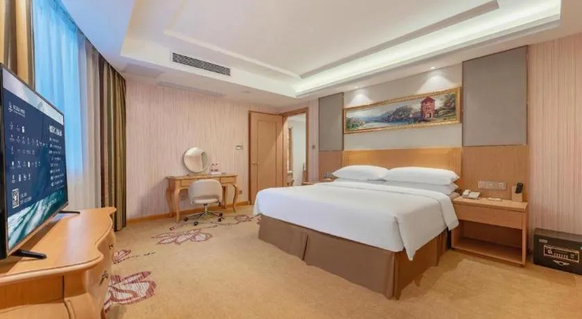 Bed in Vienna Hotel Guangzhou Baiyun Airport Huadu Avenue