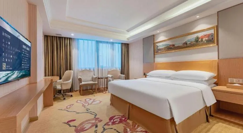 Bed in Vienna Hotel Guangzhou Baiyun Airport Huadu Avenue