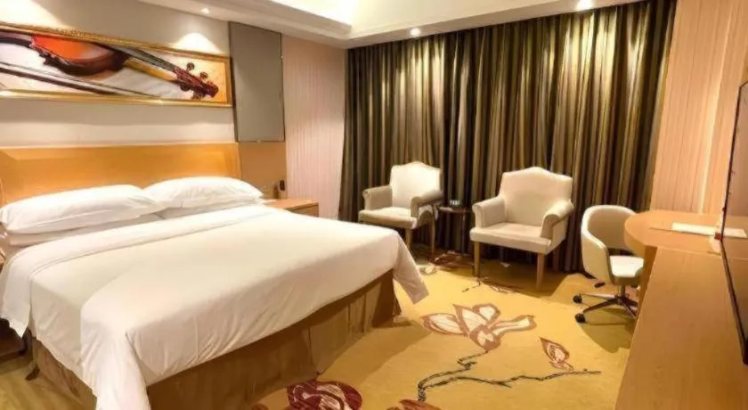 Bed in Vienna Hotel Guangzhou Baiyun Airport Huadu Avenue