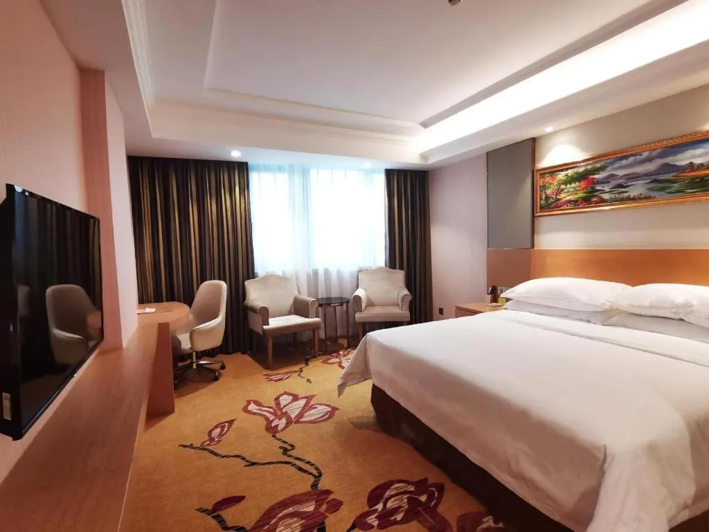 Bed in Vienna Hotel Guangzhou Baiyun Airport Huadu Avenue