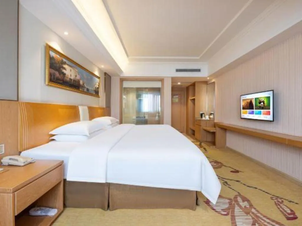 Bed in Vienna Hotel Guangzhou Baiyun Airport Huadu Avenue