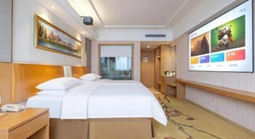 Bed in Vienna Hotel Guangzhou Baiyun Airport Huadu Avenue