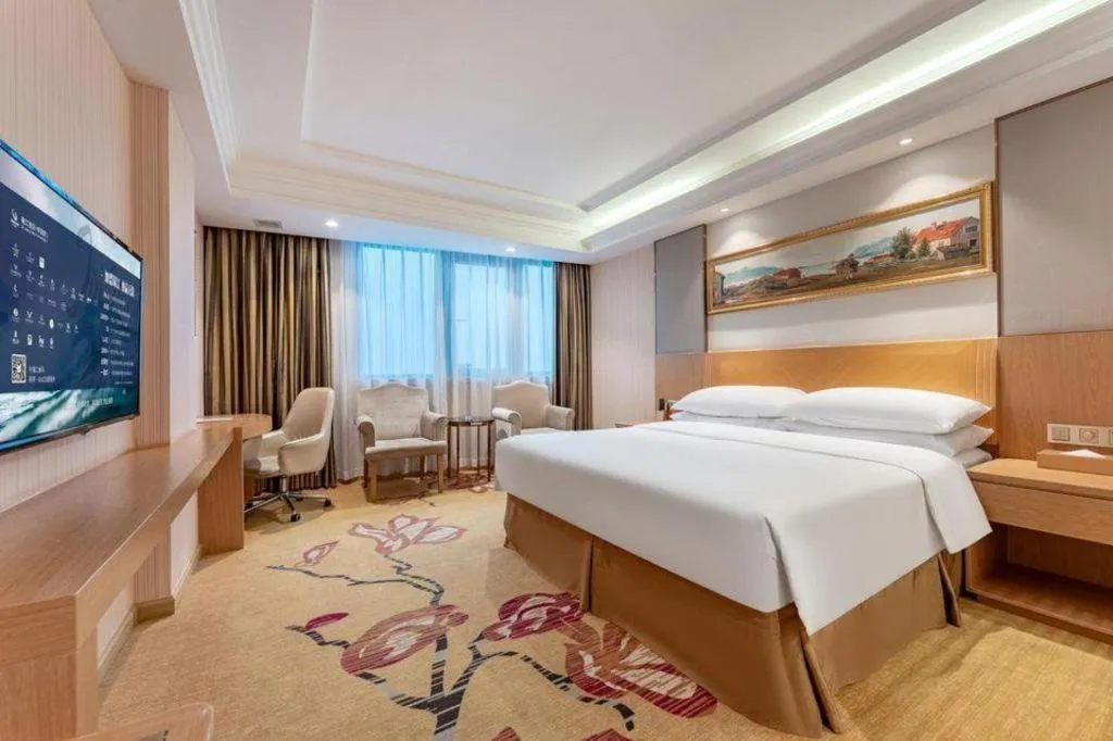 Bed in Vienna Hotel Guangzhou Baiyun Airport Huadu Avenue