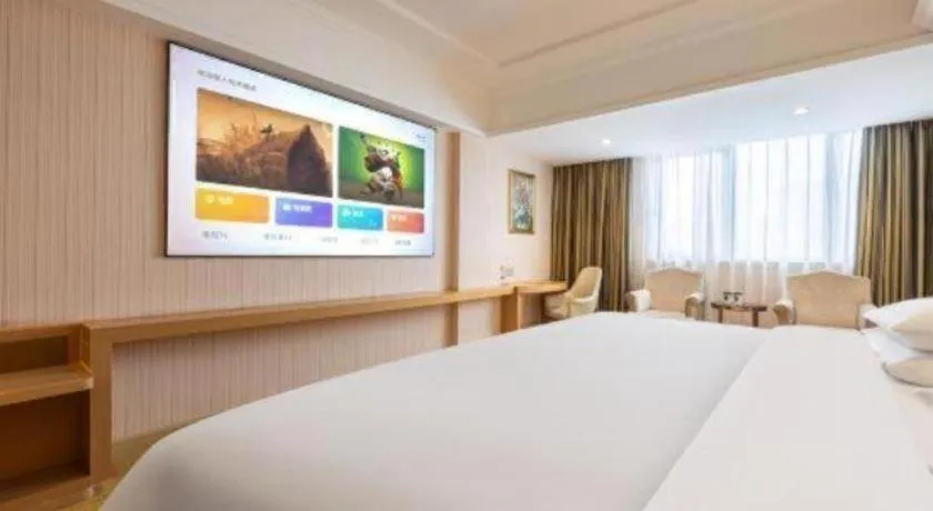 Bed in Vienna Hotel Guangzhou Baiyun Airport Huadu Avenue