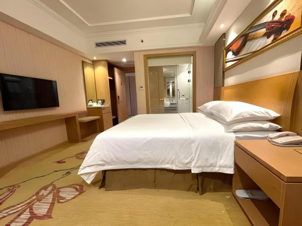 Bed in Vienna Hotel Guangzhou Baiyun Airport Huadu Avenue