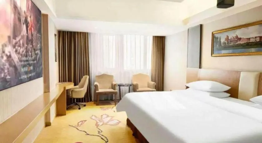 Bed in Vienna Hotel Guangzhou Baiyun Airport Huadu Avenue