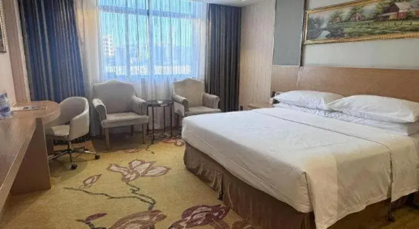 Bed in Vienna Hotel Guangzhou Baiyun Airport Huadu Avenue Bed in Vienna Hotel Guangzhou Baiyun Airport Huadu Avenue