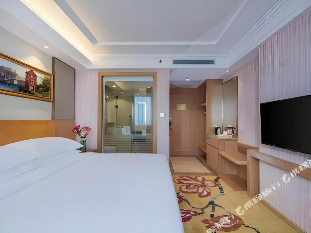 Bed in Vienna Hotel Guangzhou Baiyun Airport Huadu Avenue