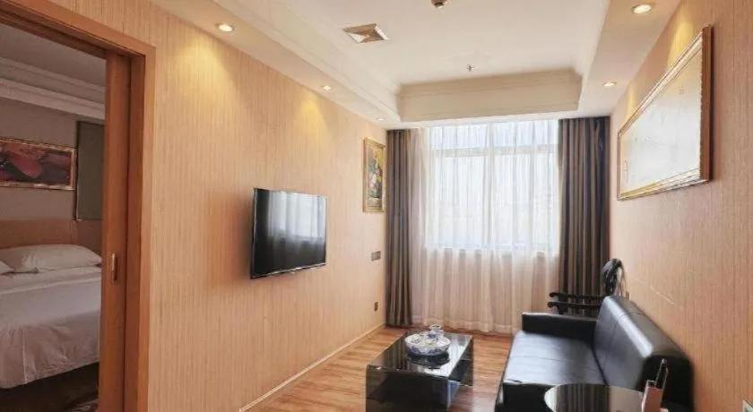 Bed in Vienna Hotel Guangzhou Baiyun Airport Huadu Avenue