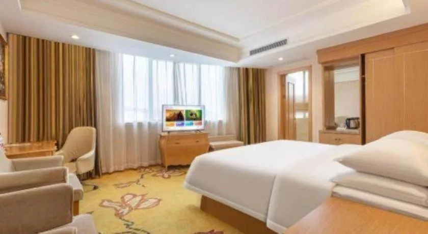 Bed in Vienna Hotel Guangzhou Baiyun Airport Huadu Avenue