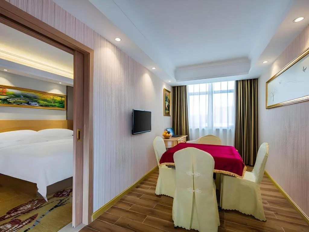 Bed in Vienna Hotel Guangzhou Baiyun Airport Huadu Avenue