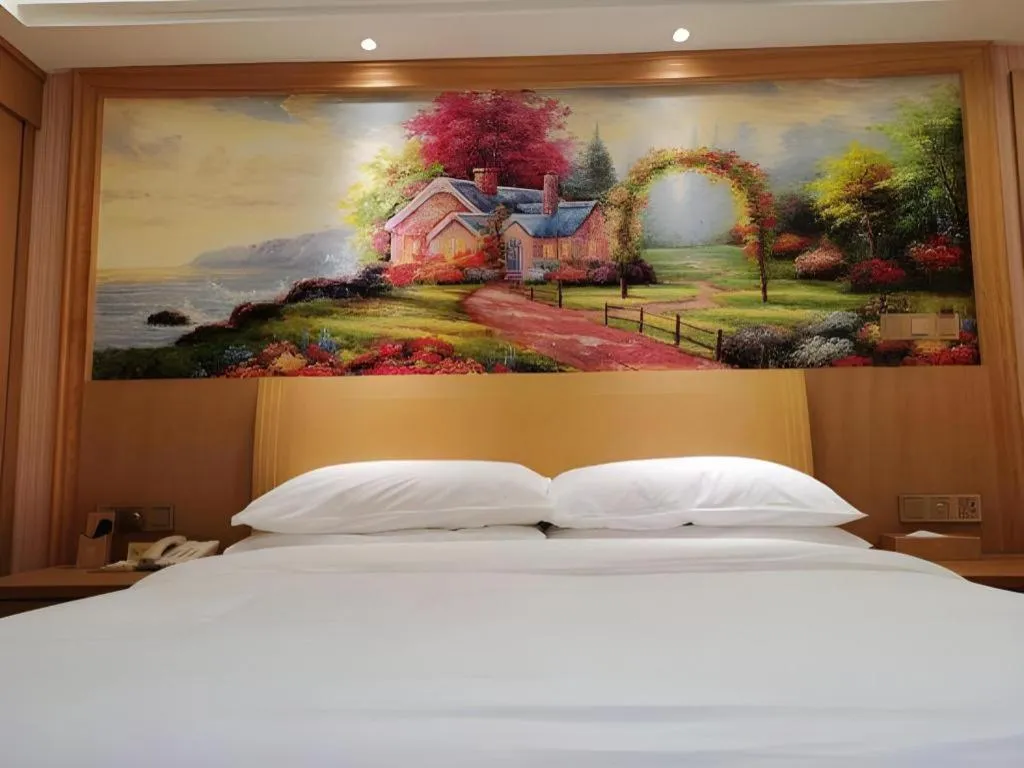 Bed in Vienna Hotel Guangzhou Baiyun Airport Huadu Avenue