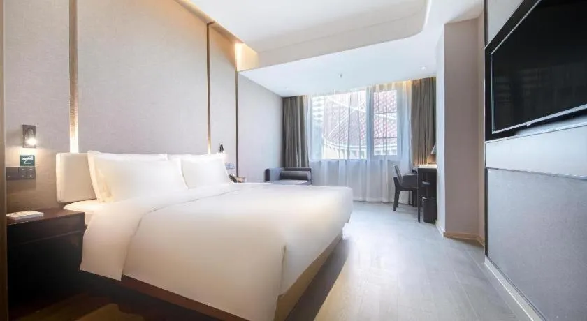Bed in Atour Hotel Wuhan Chuhehan Street Hanxiu Theater