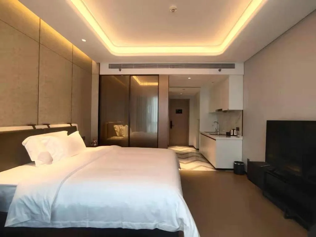 Bed in Shenzhen Cloud Park Manhattan Hotel