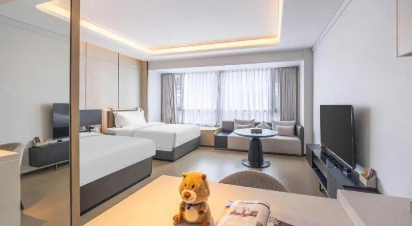 Bed in Shenzhen Cloud Park Manhattan Hotel