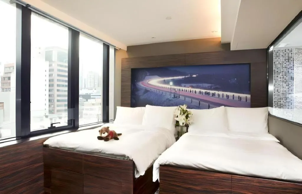 Bed in J Link Hotel