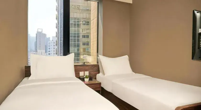 Bed in J Link Hotel Bed in J Link Hotel