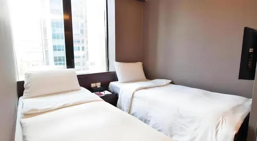 Bed in J Link Hotel Bed in J Link Hotel