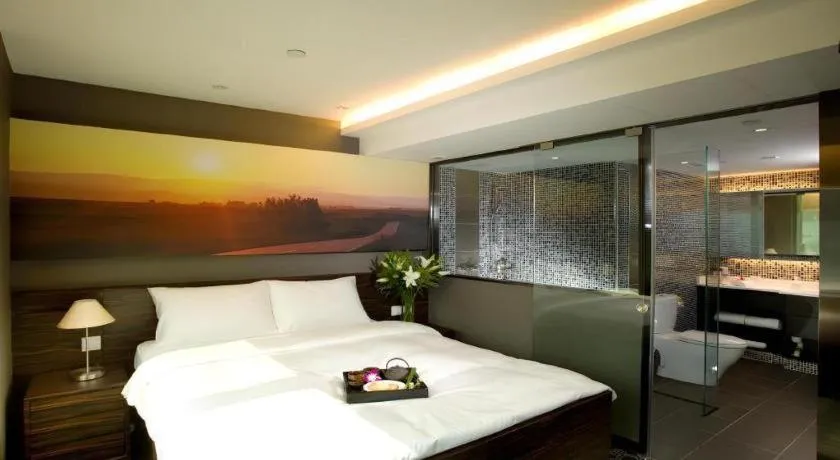 Bed in J Link Hotel
