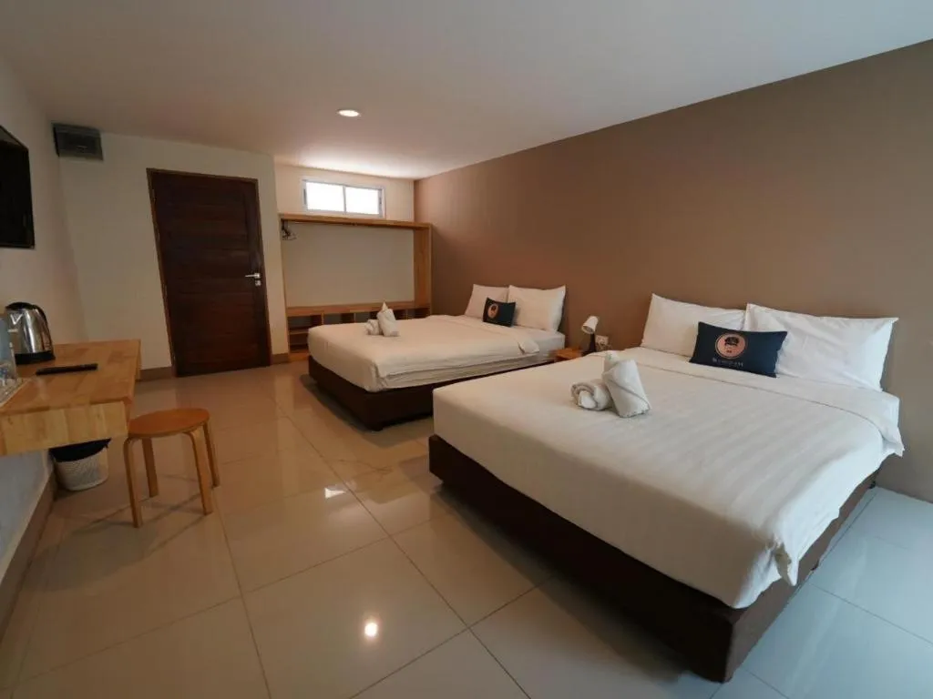 Bed in RoomQuest Chiang Mai Tha Sala