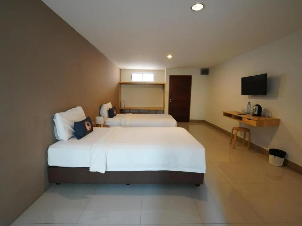 Bed in RoomQuest Chiang Mai Tha Sala