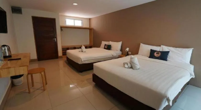 Bed in RoomQuest Chiang Mai Tha Sala