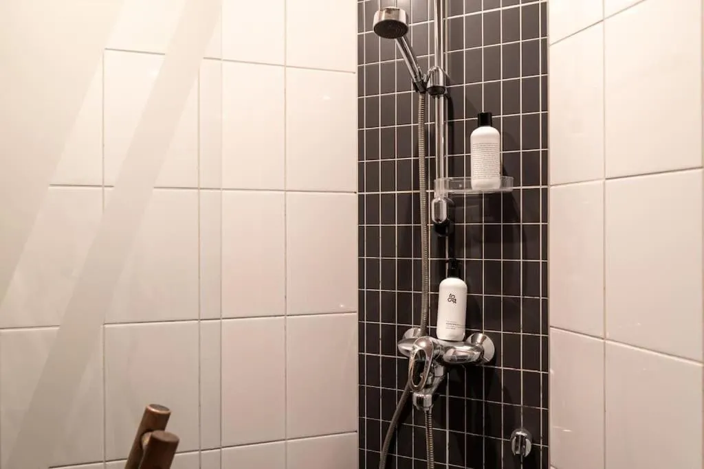 Bathroom in Cozy Studio with private Sauna