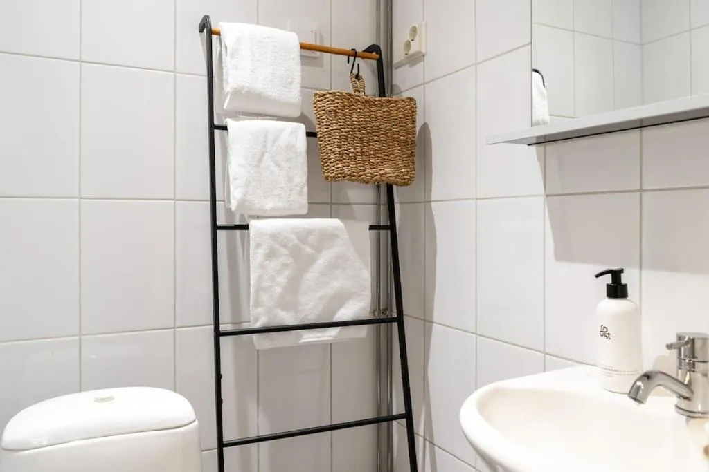 Bathroom in Cozy Studio with private Sauna