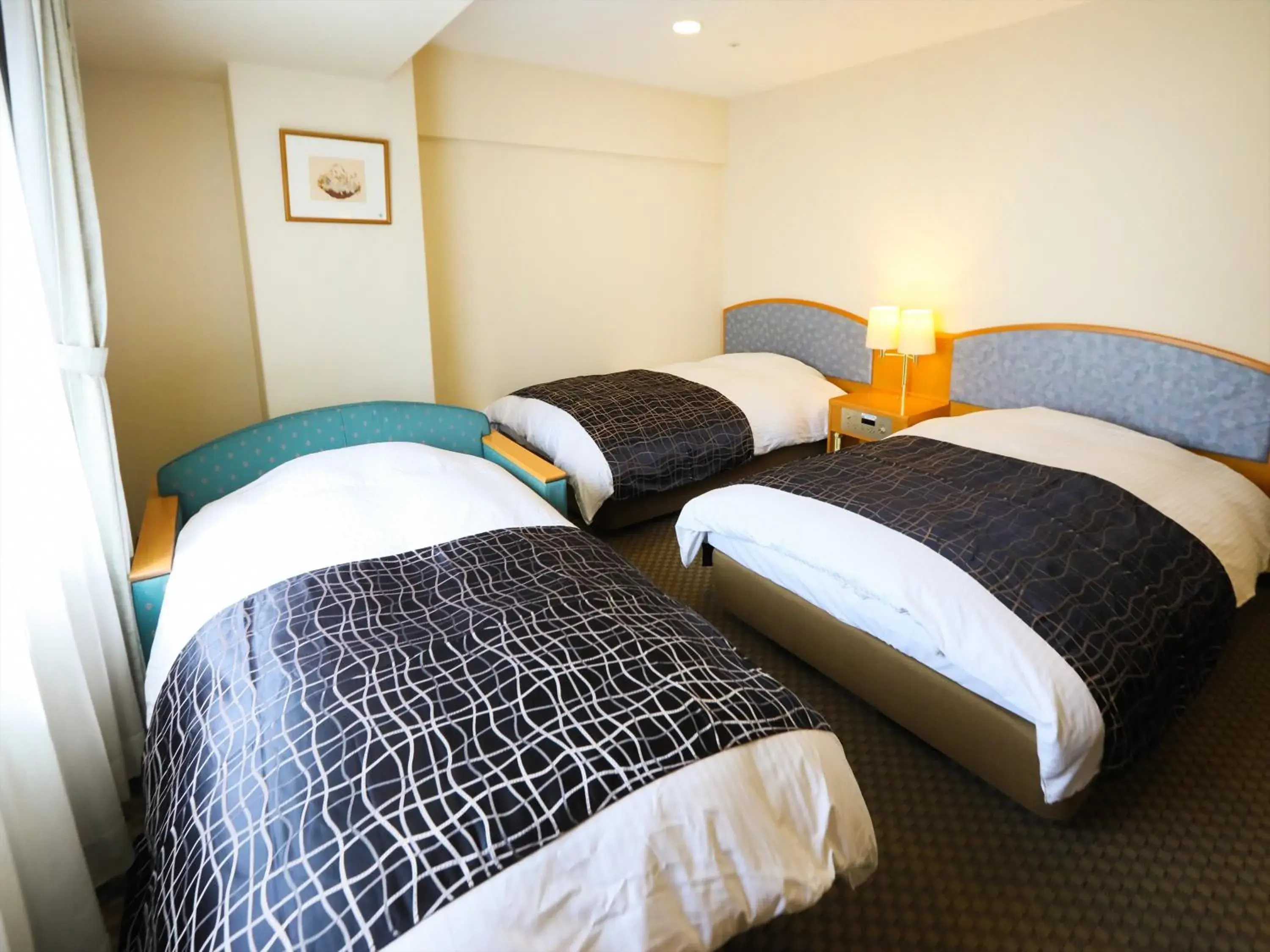 Photo of the whole room, Bed in APA Hotel Obihiro Ekimae Photo of the whole room, Bed in APA Hotel Obihiro Ekimae