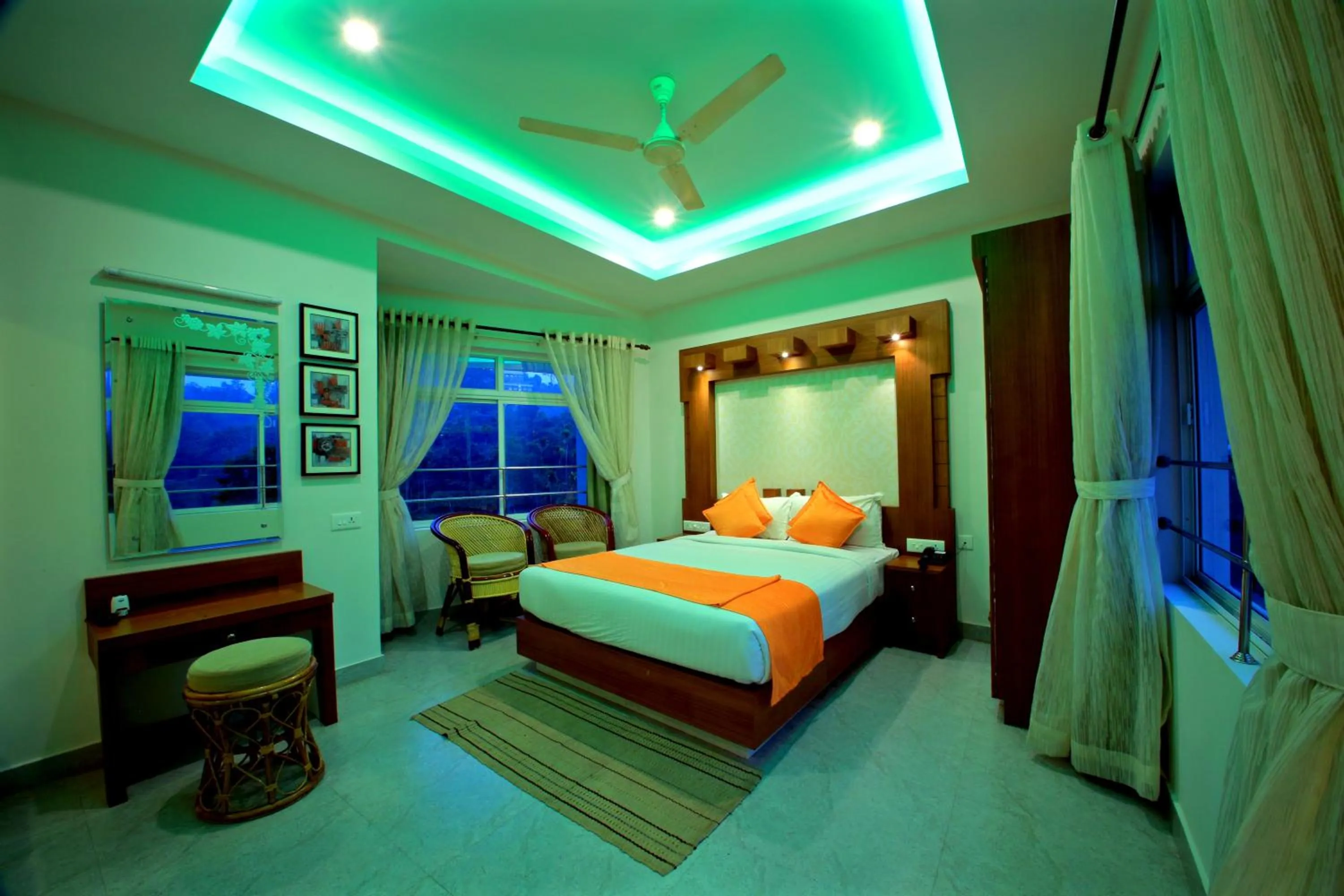 Photo of the whole room, Bed in Monsoon Grande