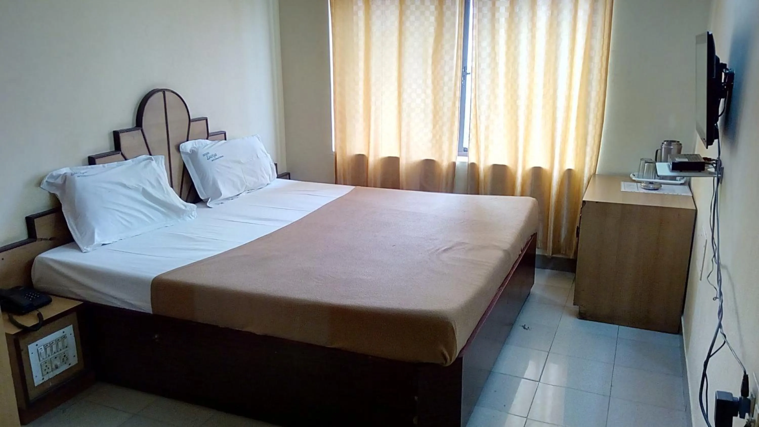 Photo of the whole room in Luciya International Mysore