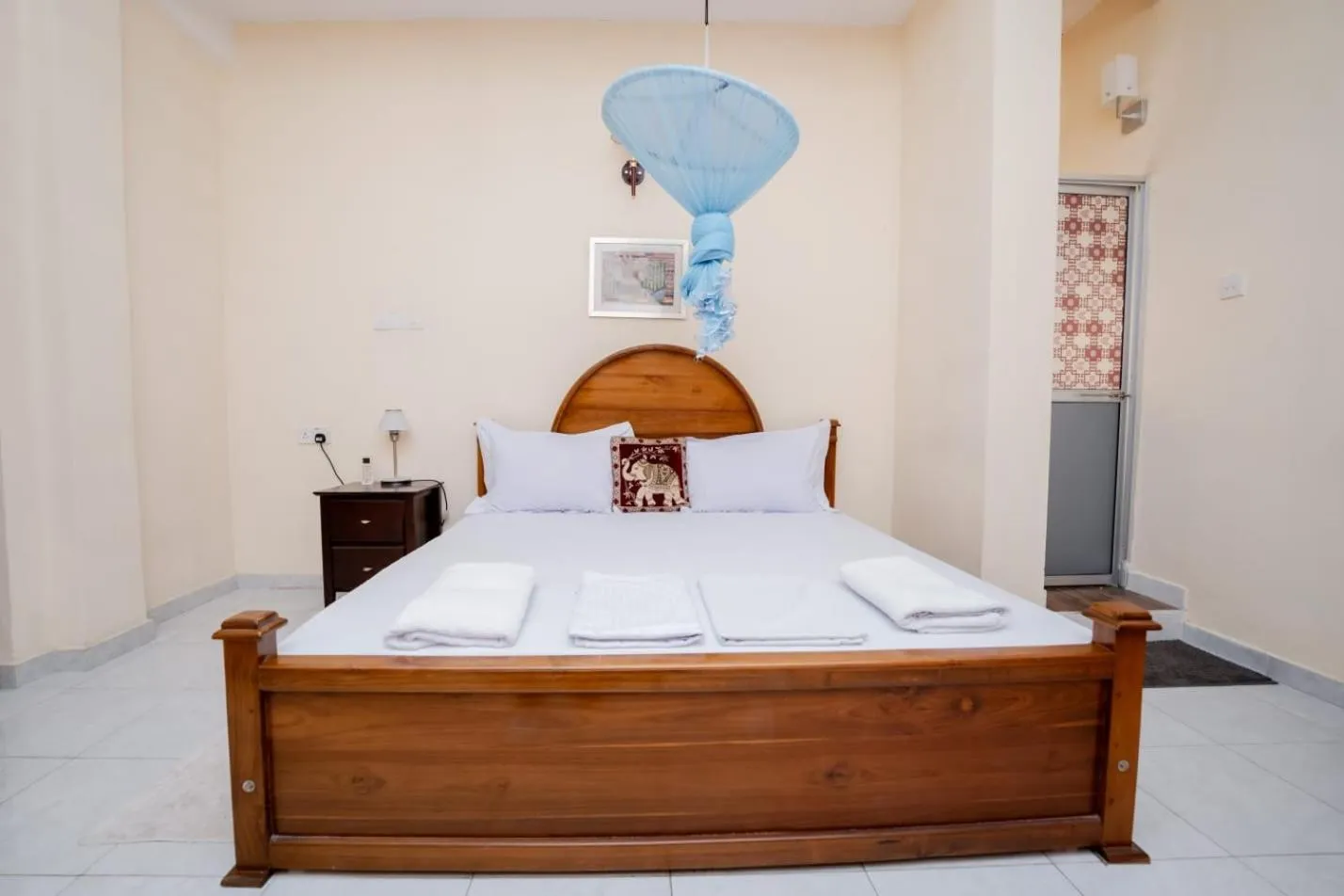 Bed in Suwani Pinnawala Homestay