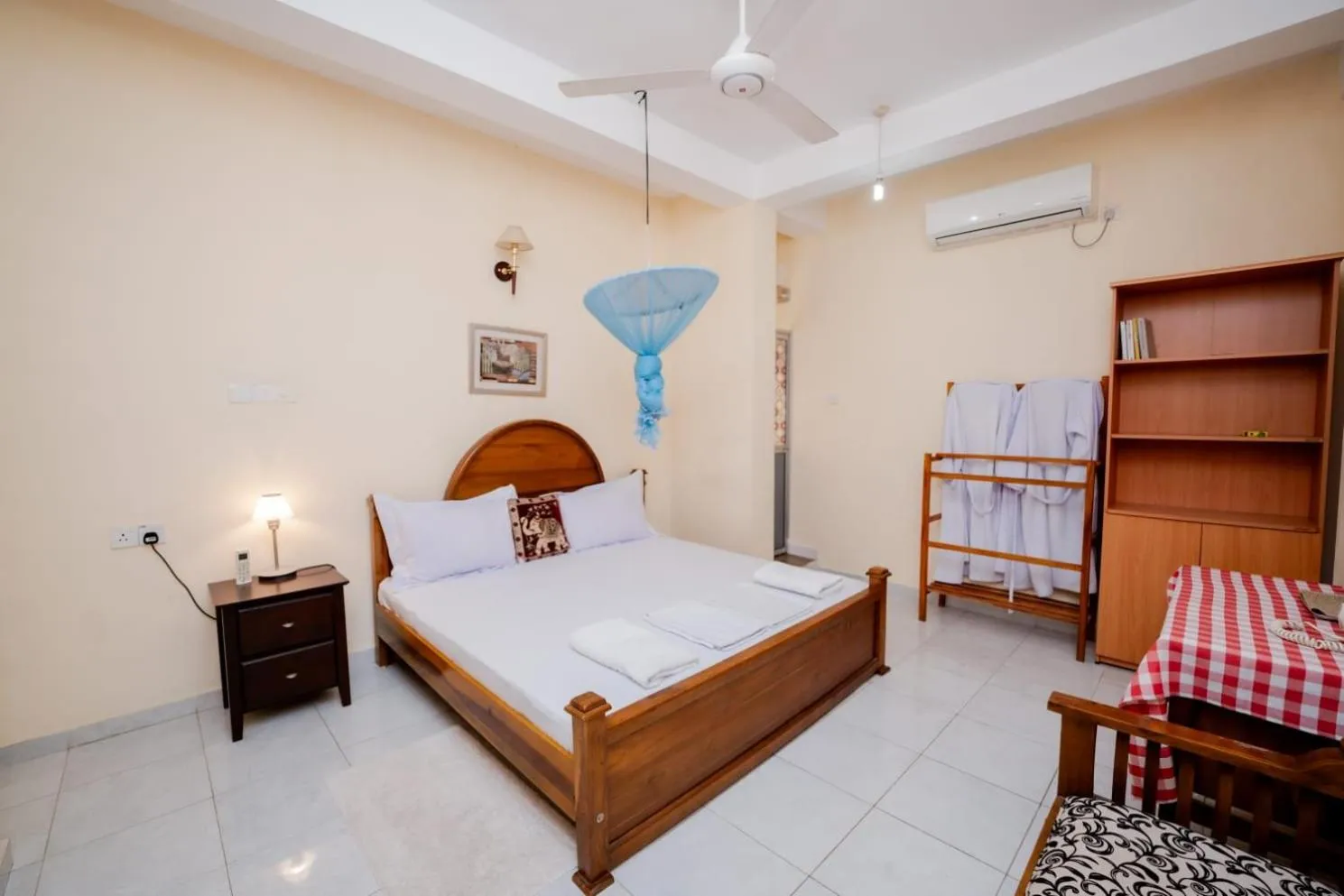 Bed in Suwani Pinnawala Homestay